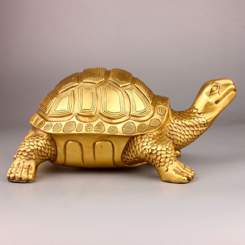 statue tortue dore